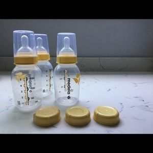 three 5oz medela bottles